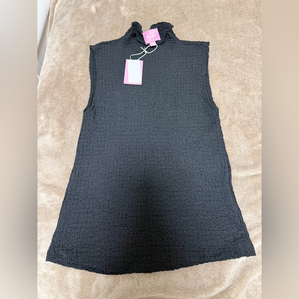 Black Garment with Pink Tag